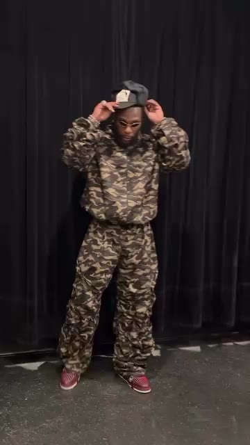 @burnaboygram wearing full DAMINI camo set 🎯