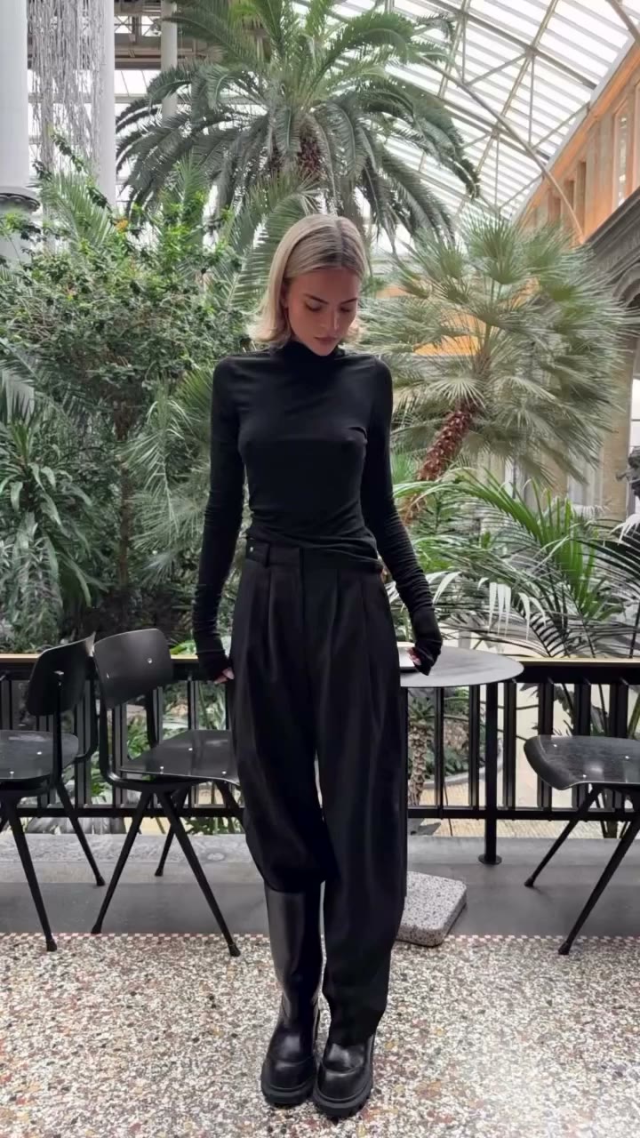 @emiliasilberg wearing Our Pleated Relaxed Tailored Trousers, a staple STEL…
