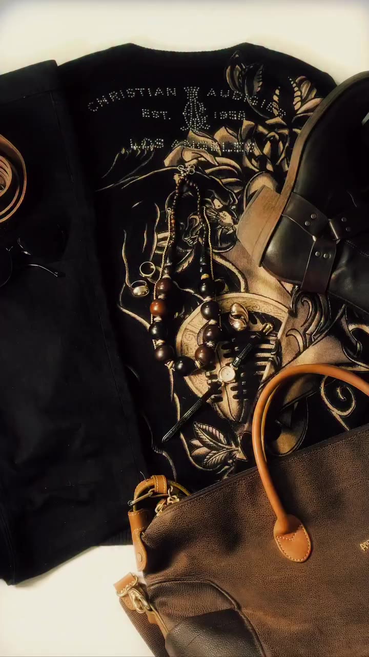 I wear that Christian Audigier