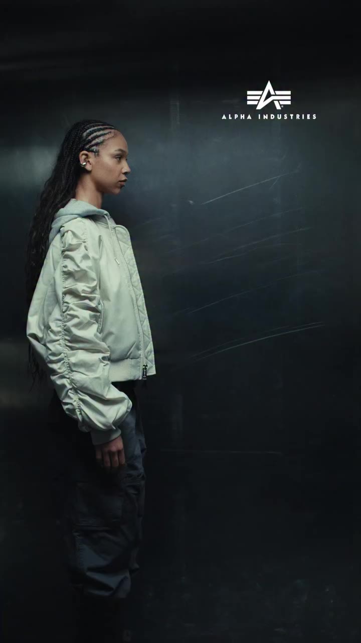 Short Hooded Light Bomber Jacket. Cropped silhouette, loose fit - a modern…