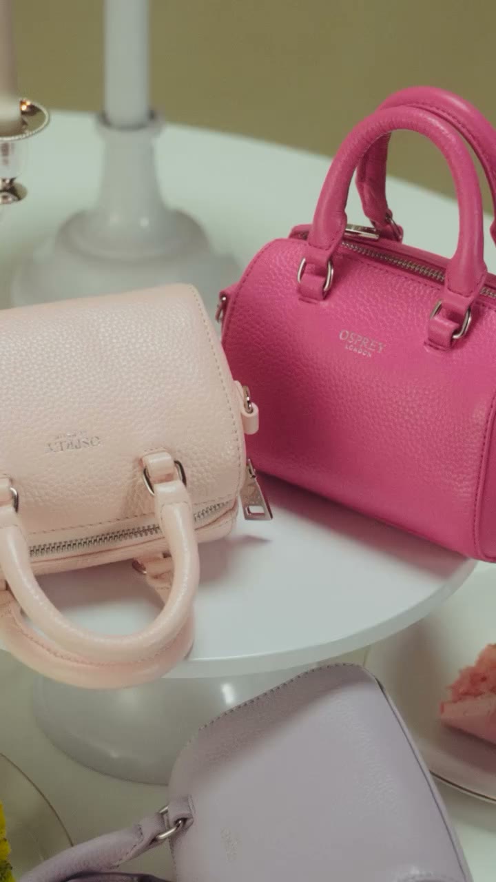 This endearing mini is ready to hold all your essentials: phone, card, lippy …