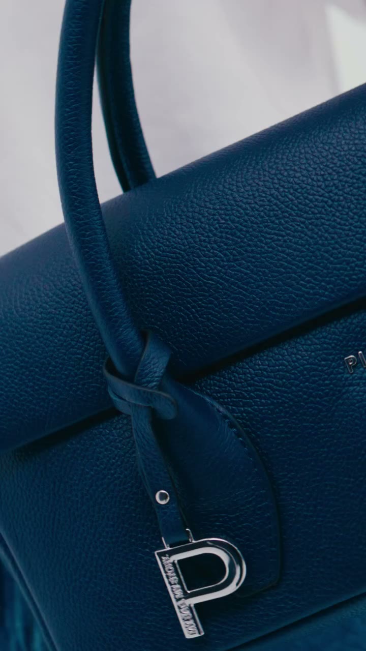 Not every bag deserves this kind of energy — but the BUSY LADY does.