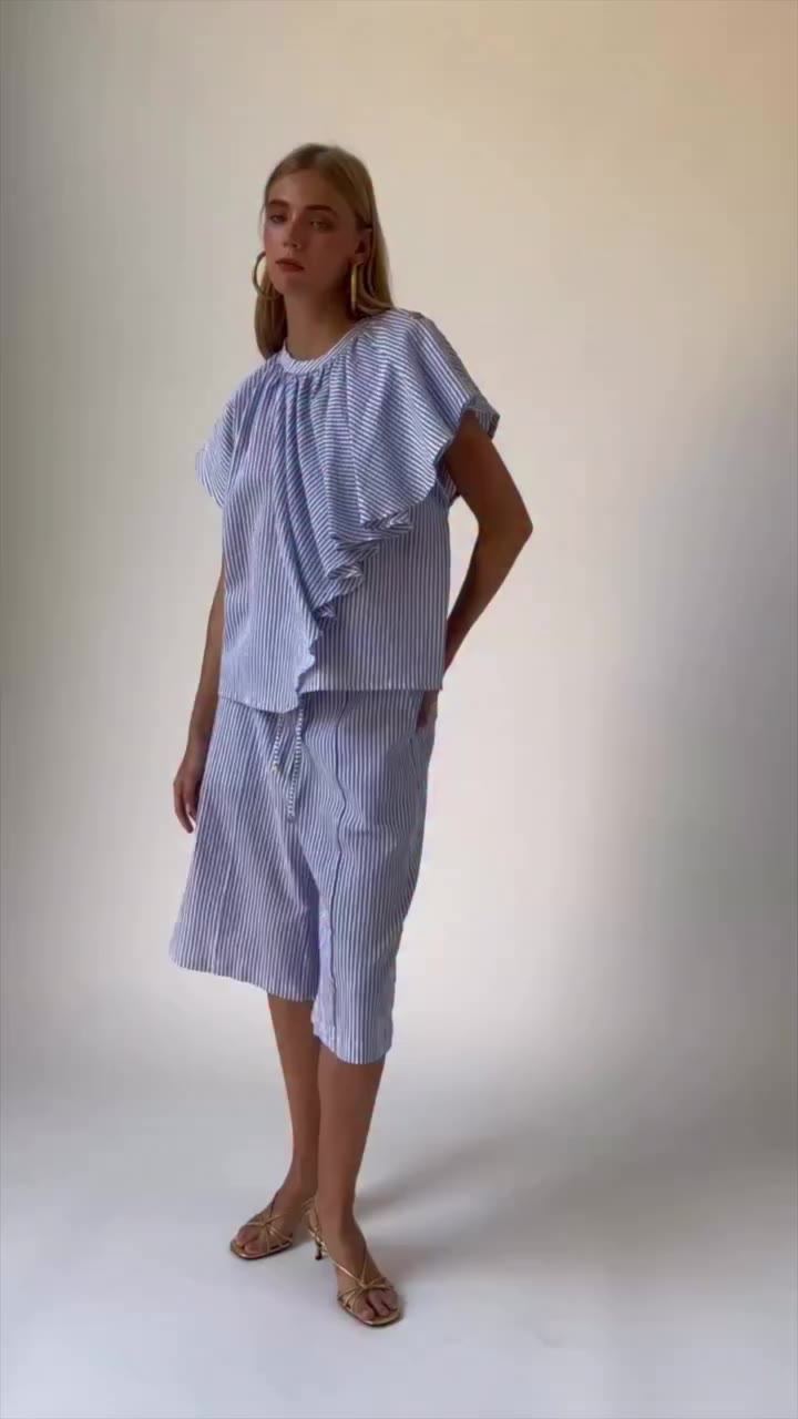 Behind-the-scenes moments with the Vivi Ibiza Blue Set. A summer essential.