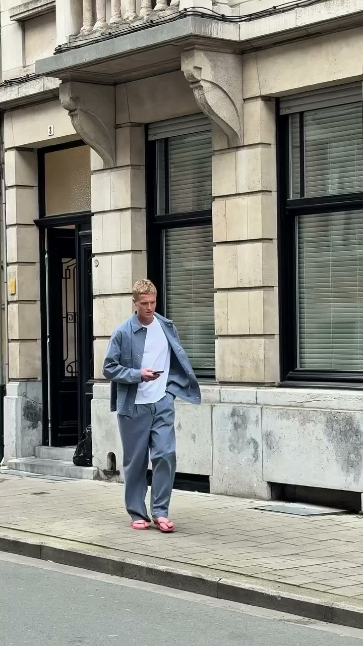 On-the-go in our workwear jacket dusty blue and pleated trousers dusty blue.
