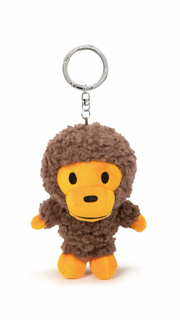 Soft, fluffy, and unmistakably BABY MILO®. 🤎 Take this plush keychain…