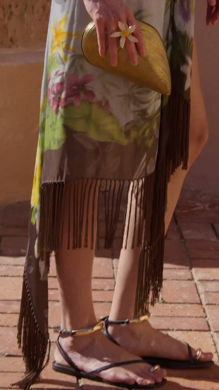 A draped silk foulard group, woven with metallic thread, is expressive for day…