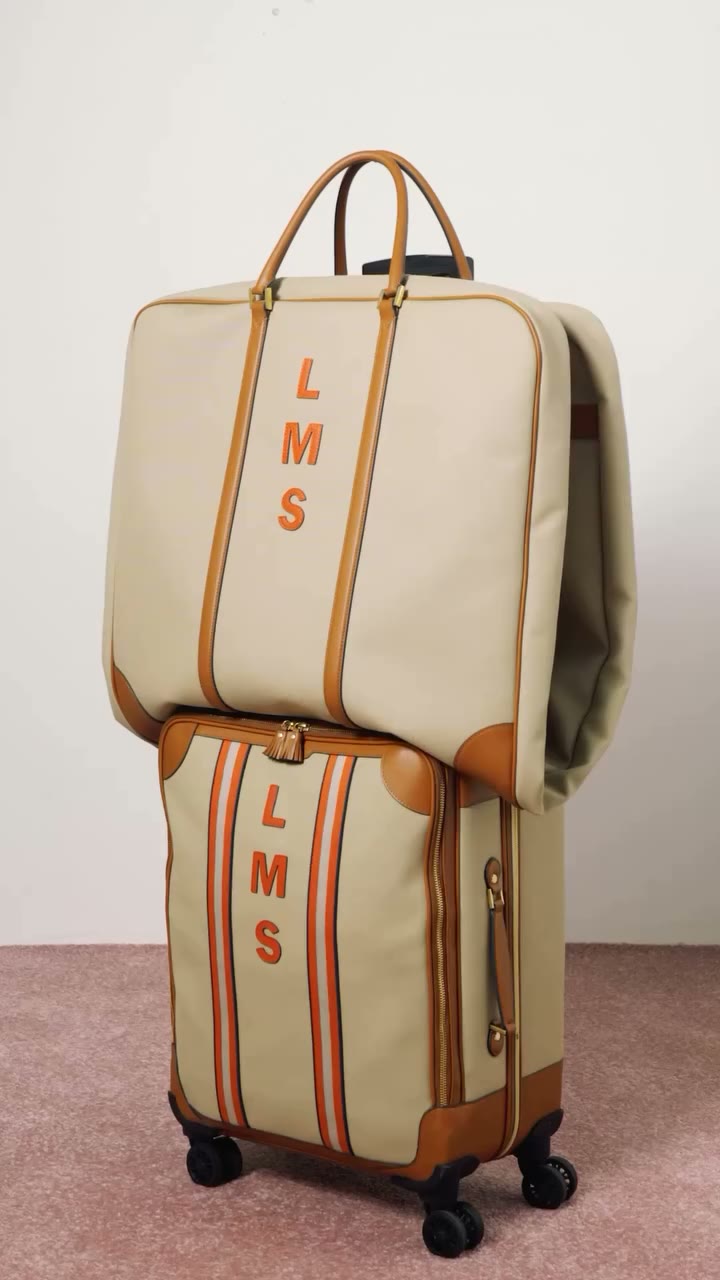 Meet the Bespoke Garment Bag. Crafted from canvas and leather to complement…