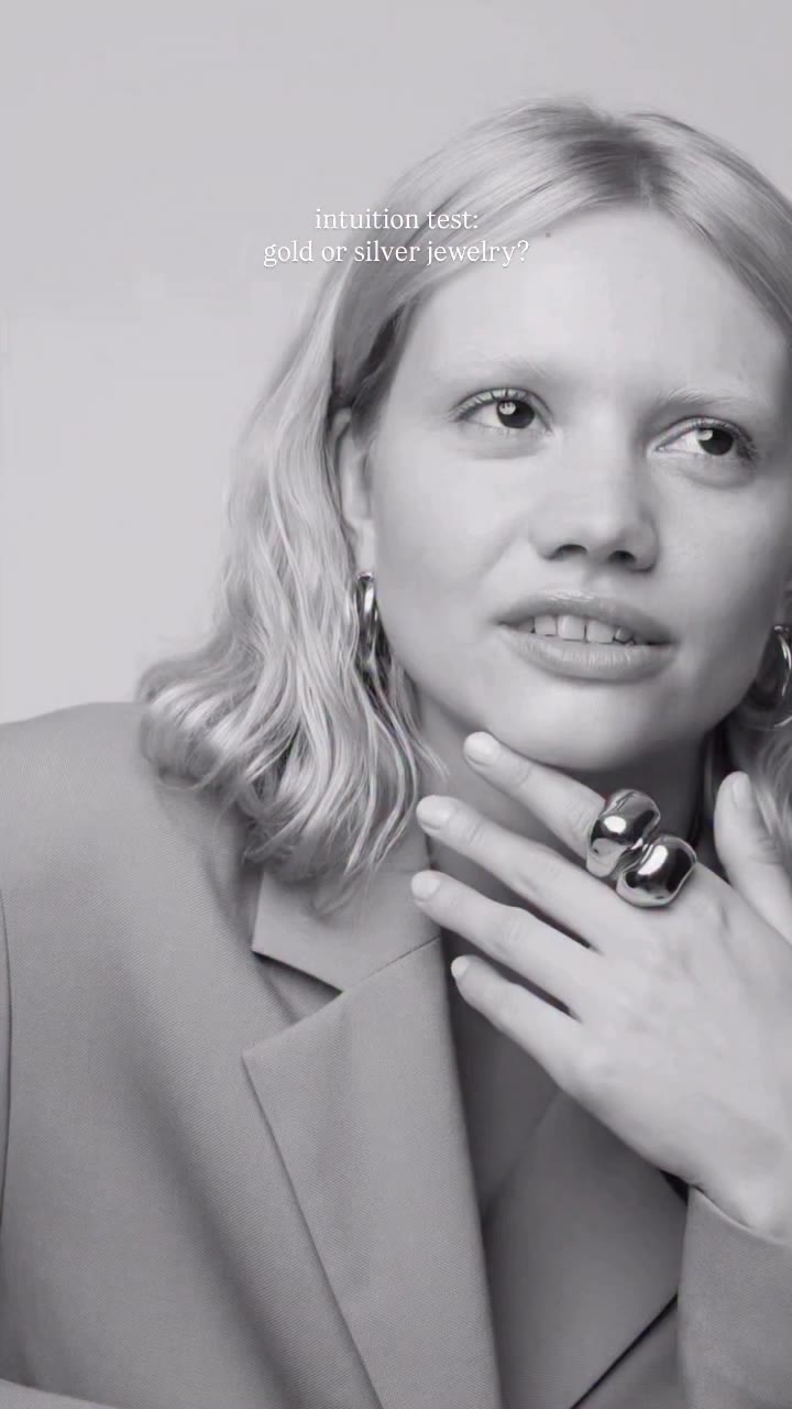 the sculpted bold ring, stacked. the double sculpted hoop earrings. model…