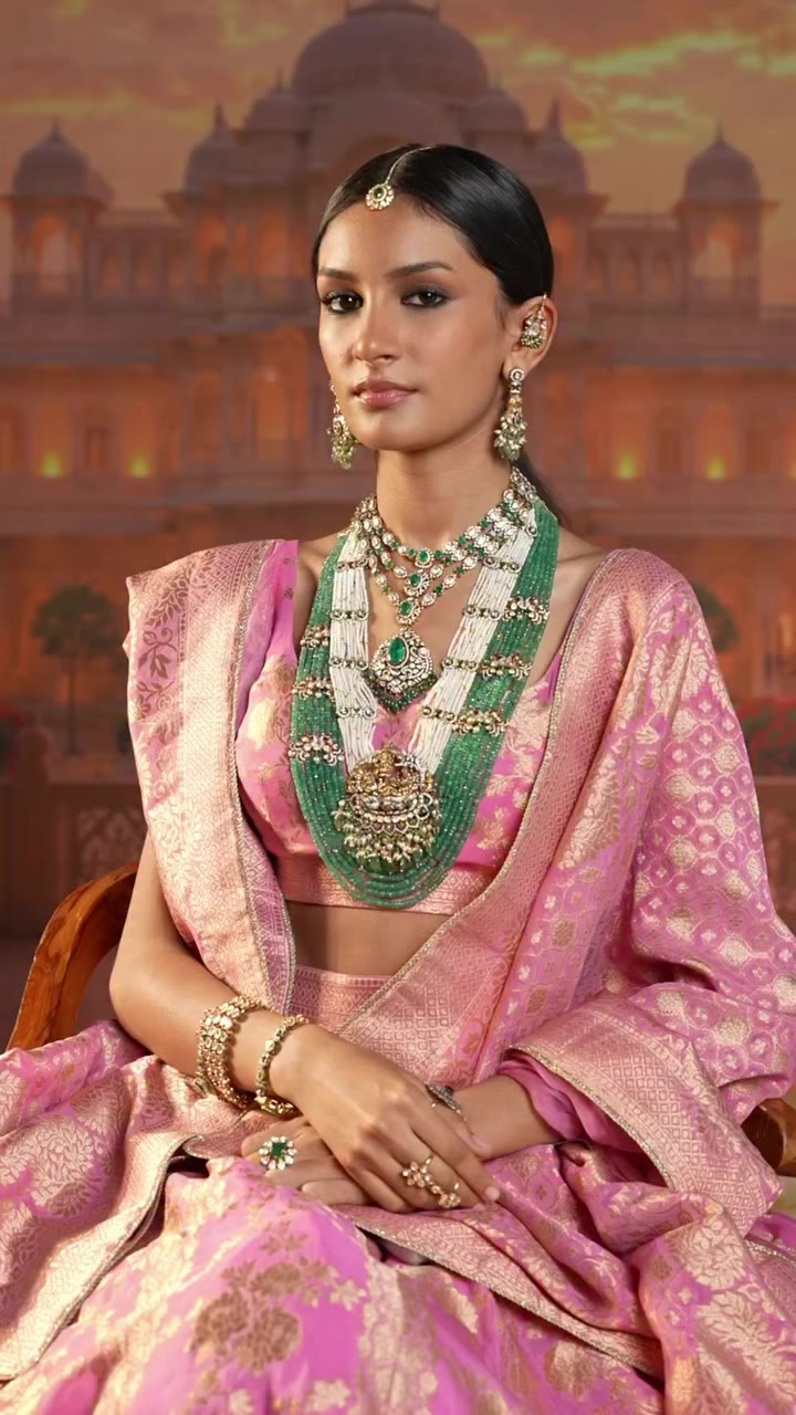 Layers of emeralds, pearls and intricate kundan come together in a look…