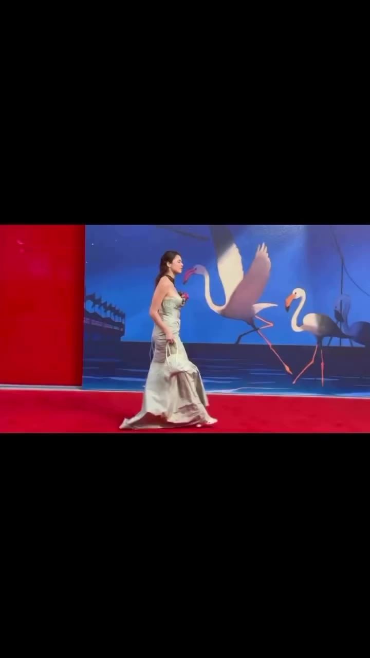VENICE FESTIVAL • Actress @michelle_ellyse wears @deborahlindquist gown at the…
