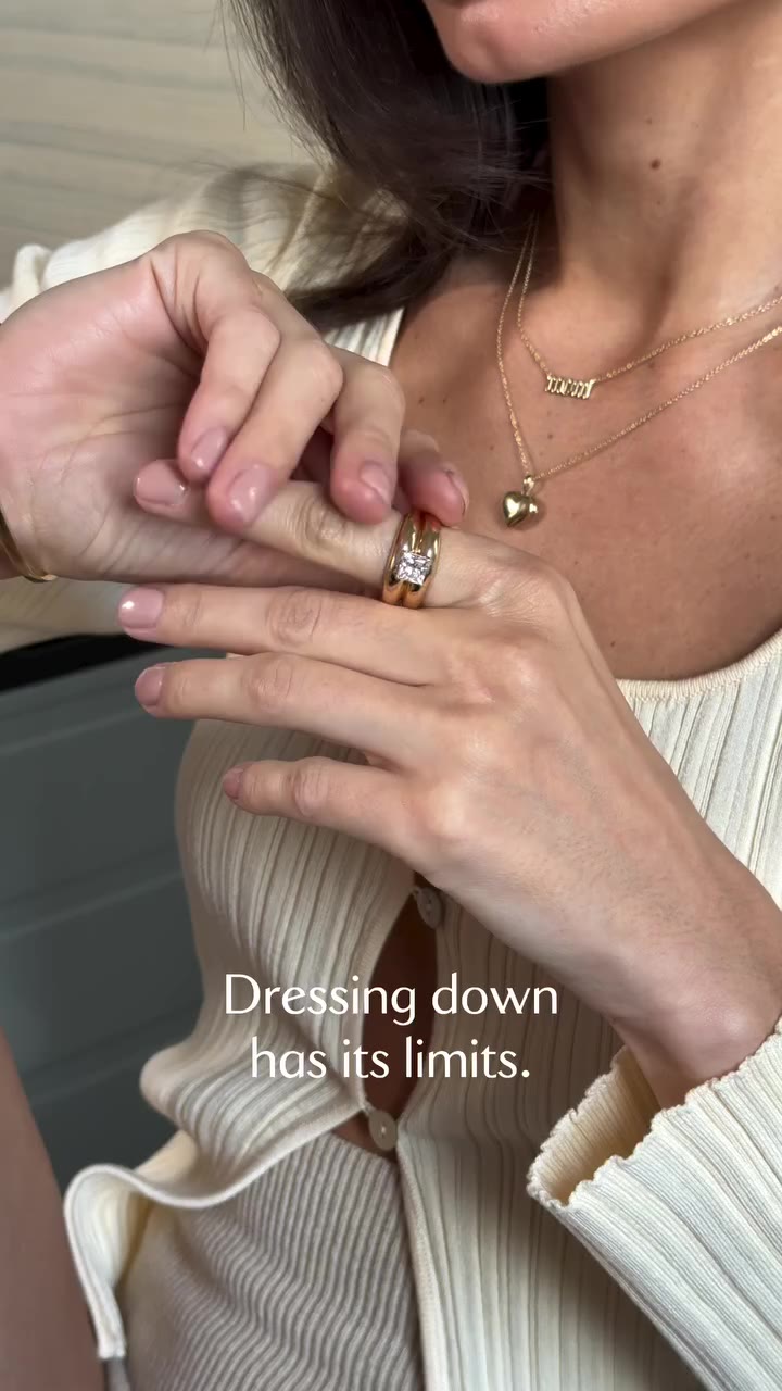 Knitwear, bare feet, and enough solid gold to suggest this was intentional.