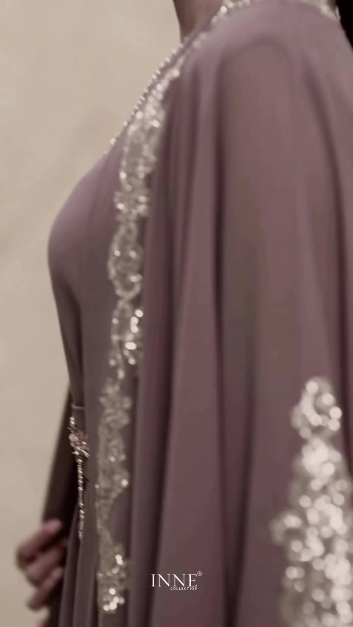 Viona. A timeless kaftan in fluid chiffon, layered with an elegant inner and…
