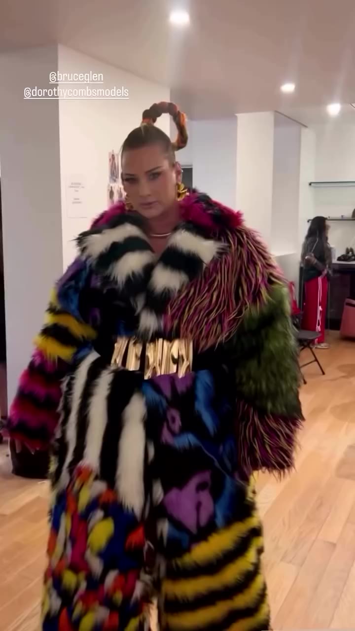 Behind the scenes before the runway magic happens! @emileeraexo getting ready…