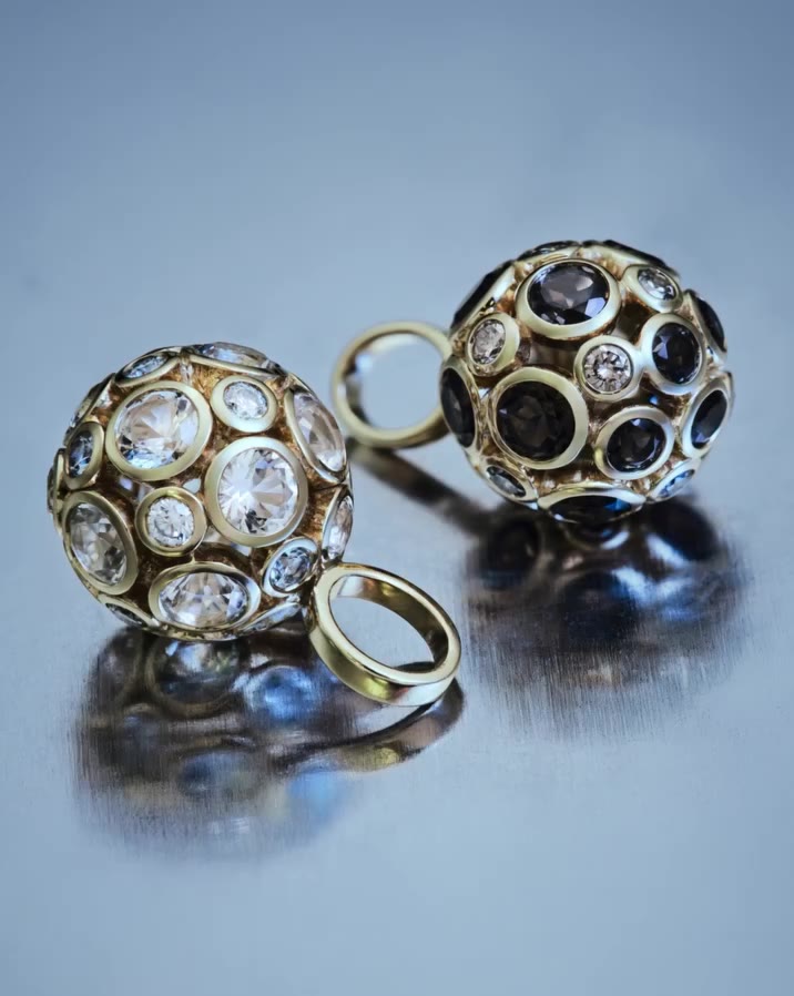 Smoke & Light⁠ ⁠ The Globe pendant, in two readings of the same idea - smoky…