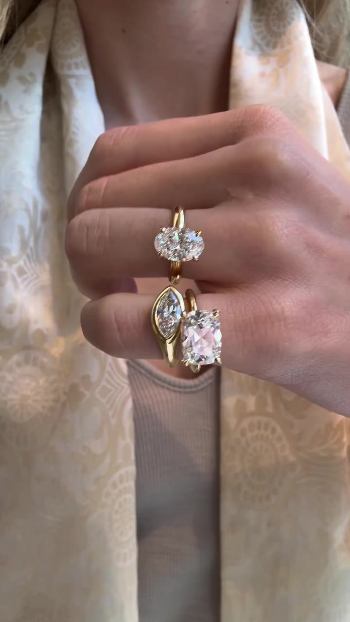 Natural oval, marquise and cushion cut diamonds, set in 18K yellow gold. Book…