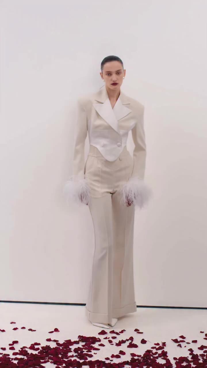 Meet Swan from Fall Winter 2026. Sculpted tailoring in milky wool and satin…
