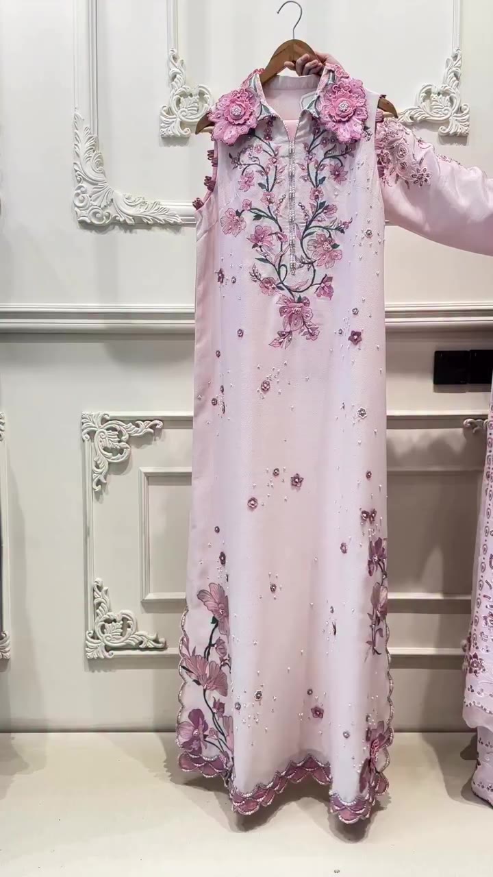 The name of this kaftan was chosen “ Blush Dream “ because the embroidery is…