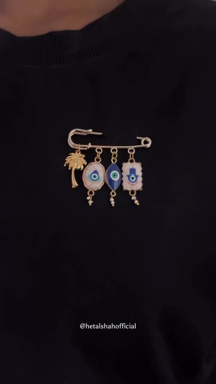 The one brooch you won’t be able to move on from.👀 Nazar charm, but make it a…