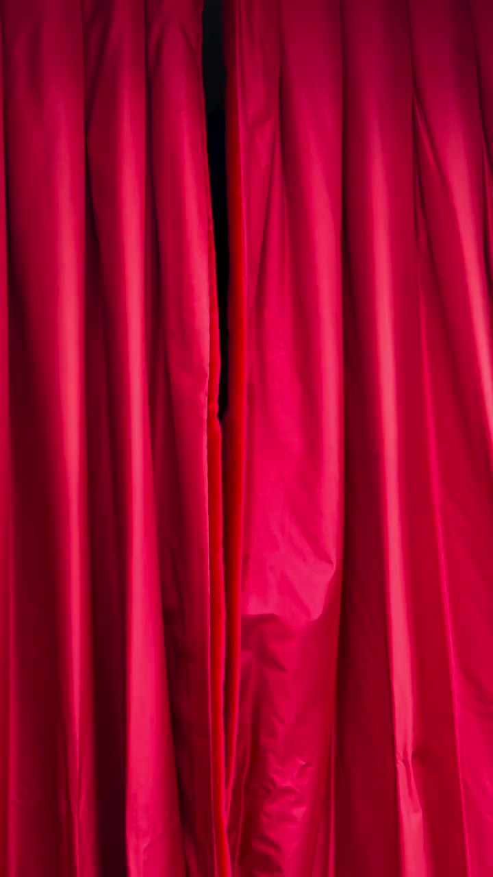 Behind velvet curtains, silk and delicate lace catch the light. A quiet…