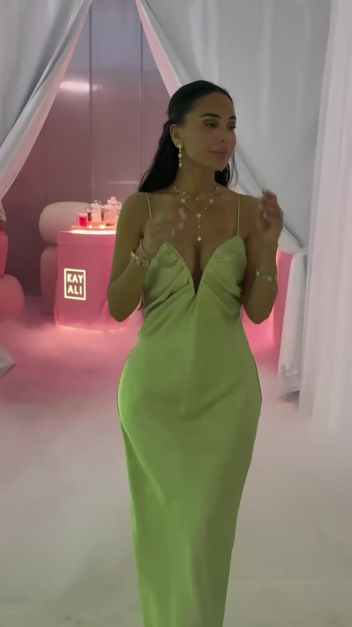 Green dress, Sade playing, and jewelry I didn’t wait for a man to give me…