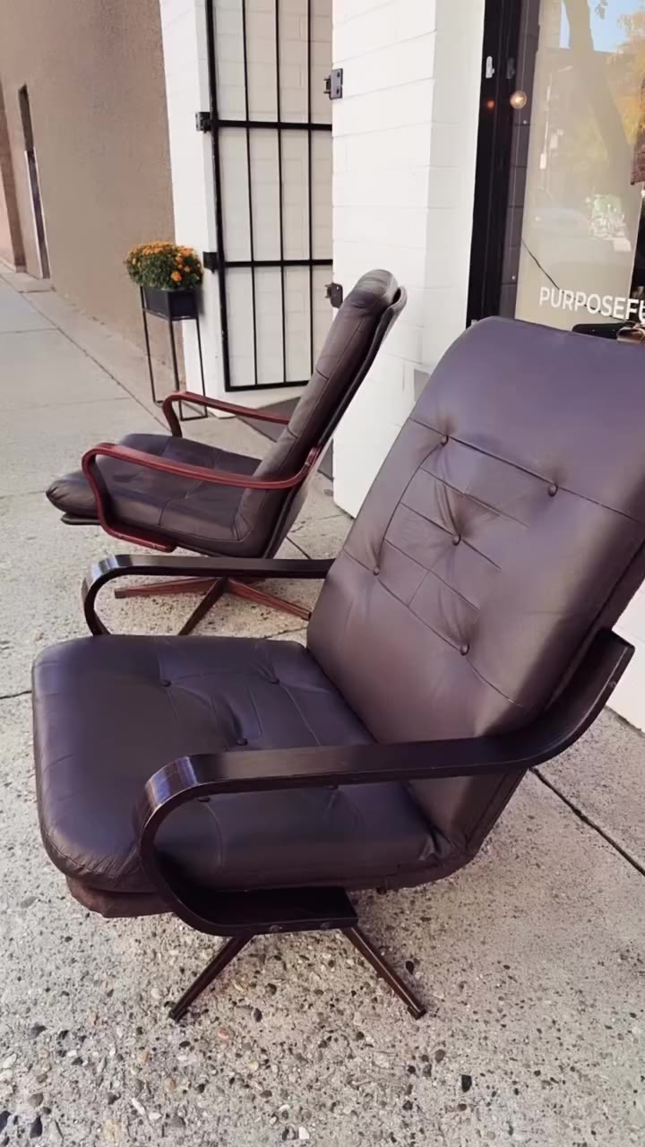 MID-CENTURY MODERN PATCHWORK DANISH BROWN SWIVEL CHAIRS have the perfect…