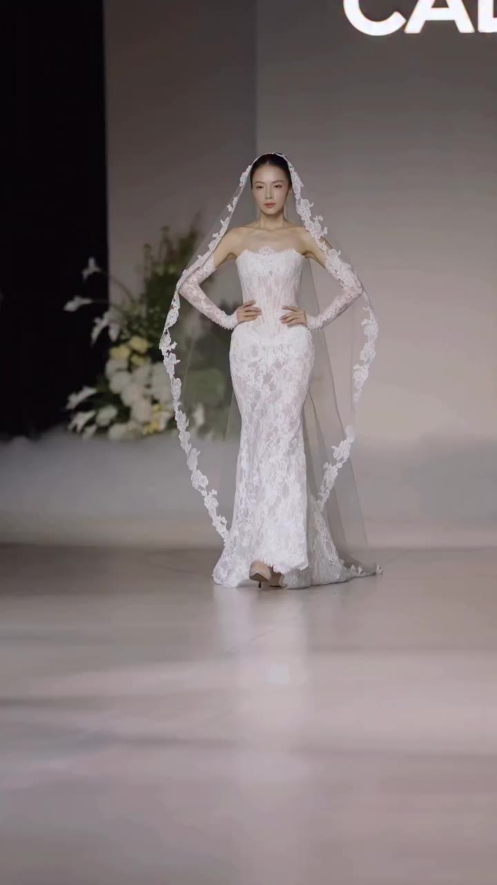 Softly fitted and beautifully relaxed, this refined mermaid silhouette brings…