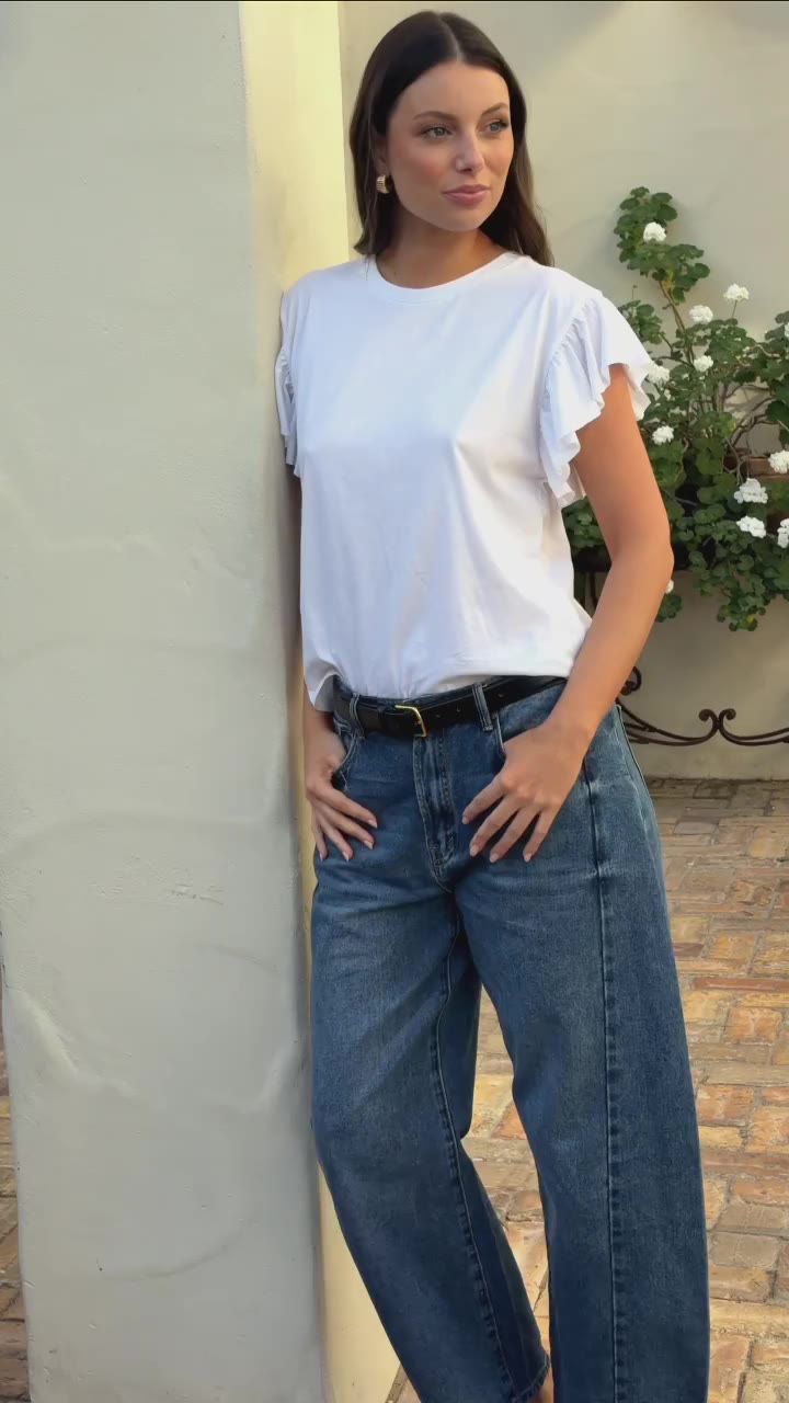 Just a white tee. With flutter sleeves. That we cannot stop thinking about. 🤍…
