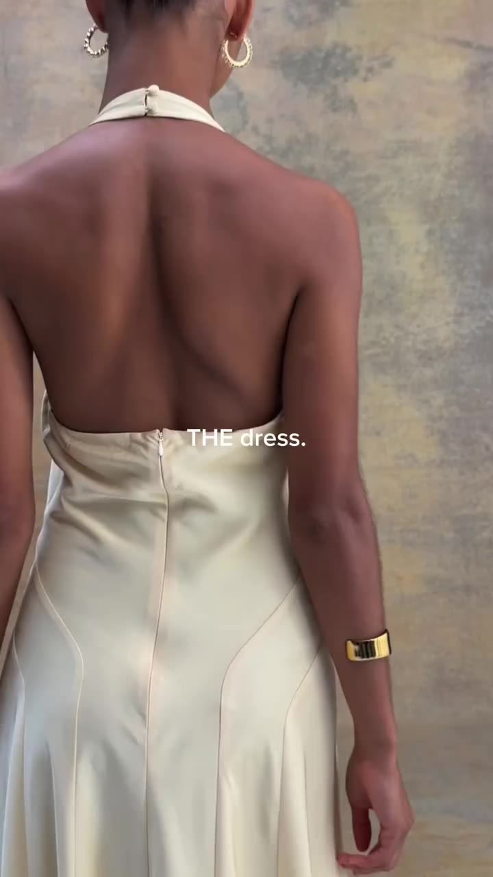One dress for every RSVP.⁠ Shop the Santana Halter Satin Dress now.