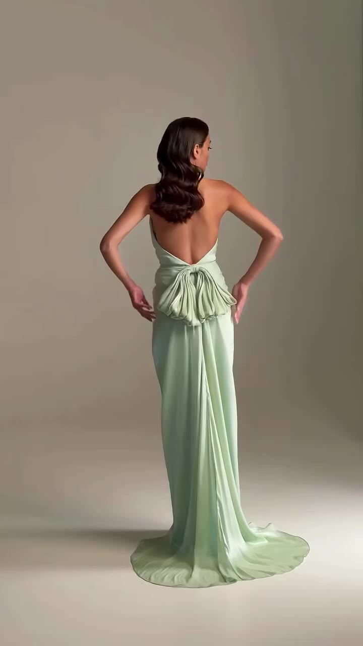Soft in color👗Bold from every angle🤍 An open back, a flawless silhouette…