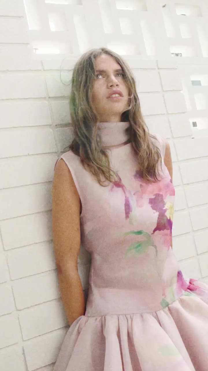 Spring in bloom. Rosaria florals unfold across the Alina Gown.
