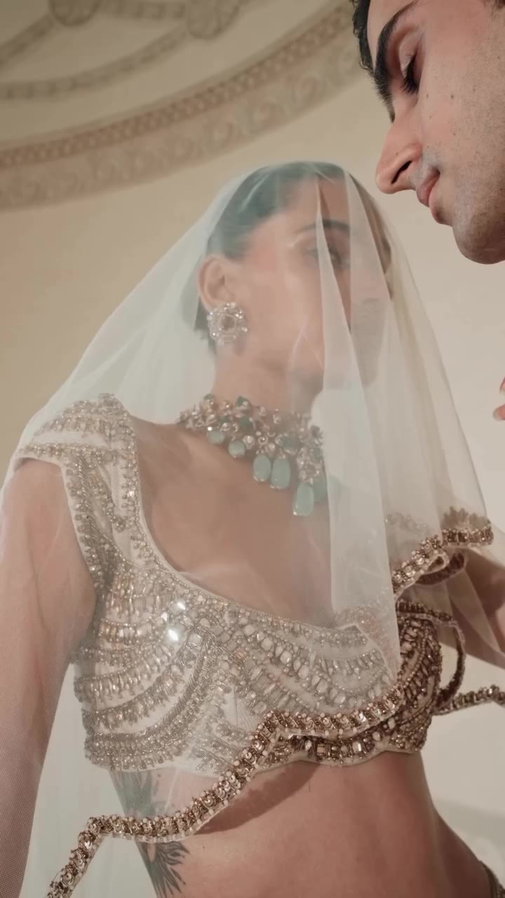A world shaped in precious stones. A singular jewelled bird emerges through…