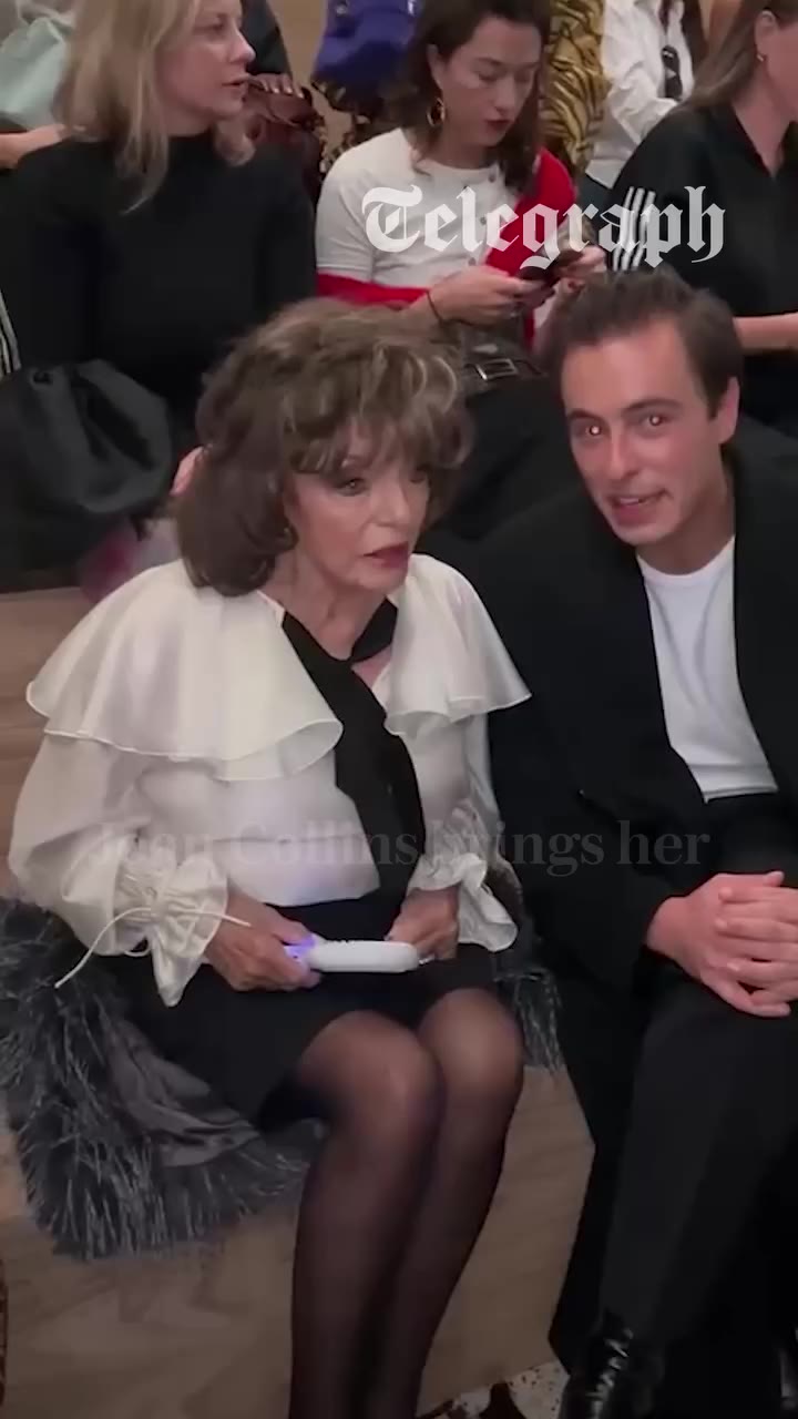 Joan Collins was spotted with her own wind machine at the M&S fashion show…