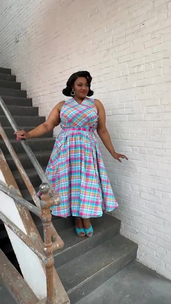 Susie looks pretty as a picture in her Sleeveless Claire Dress! She makes…