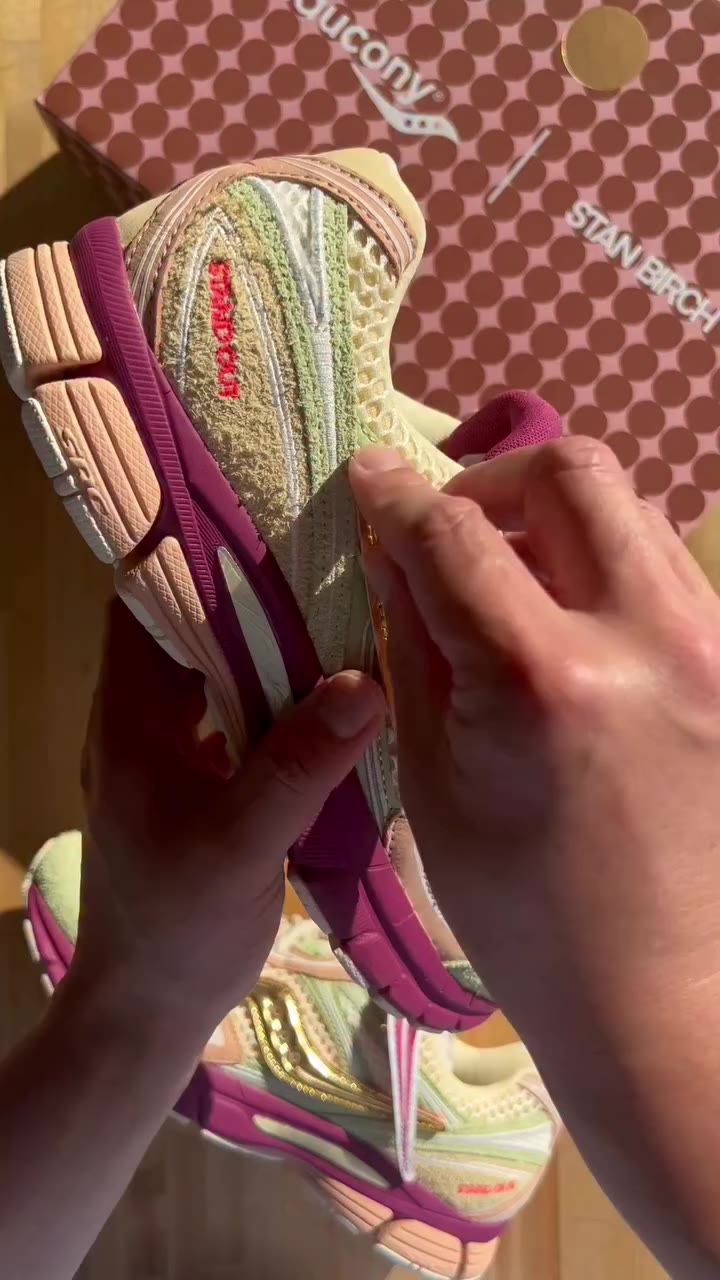 Saucony Progrid Guide 7 by Stan Birch, featuring a customizable logo on the…