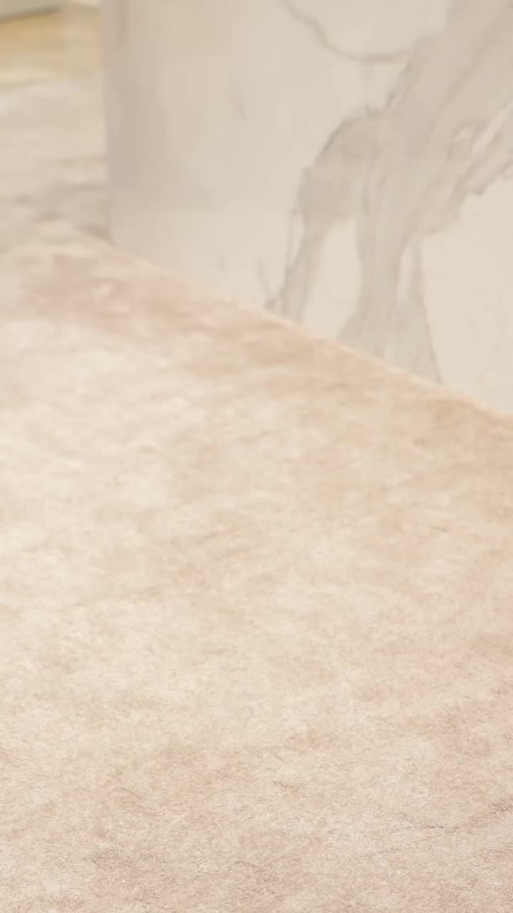 Embrace the season in statement boots by Stuart Weitzman, where rich textures…