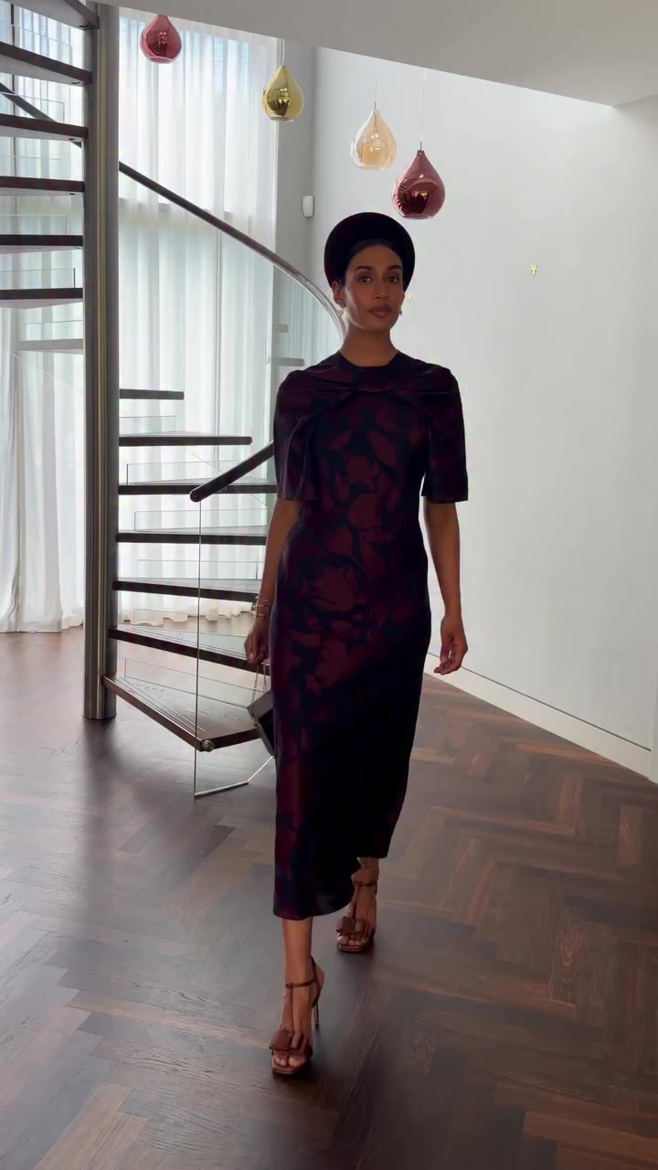 Cut from a beautiful Italian wool and silk devoré in rich navy and deep…