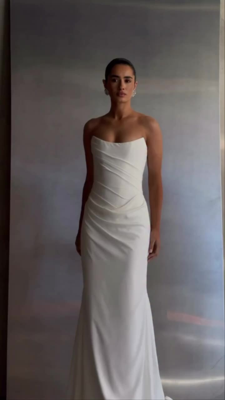 AVAILABLE AT SPHERE — The ARCHER gown by @kyhabride. Draping becomes an art…