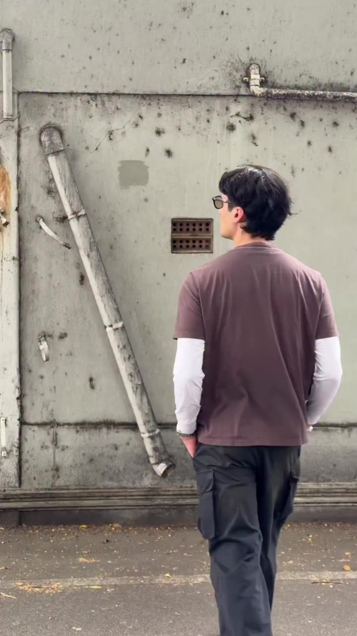 Slowly getting warmer. Casual outfit with a brown tee and washed black cargos…