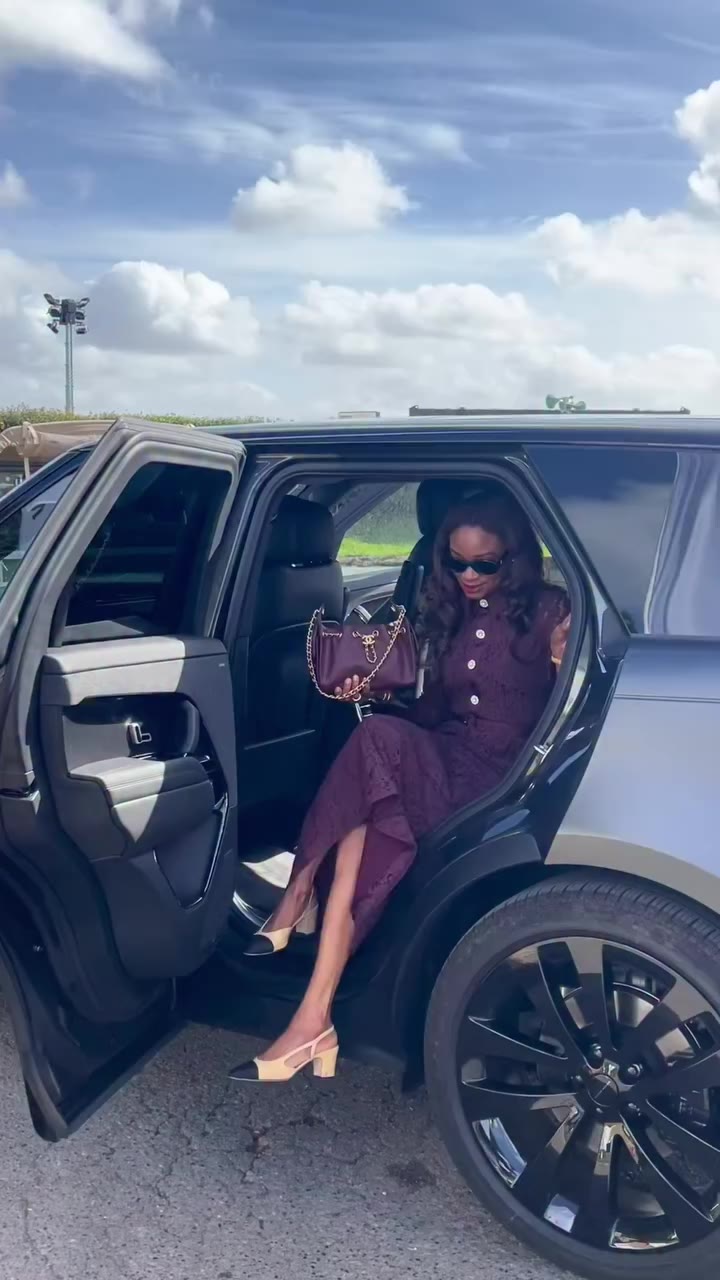 arriving at the Goodwood event with @rangerover Wearing a burgundy lace dress…