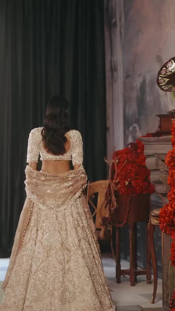 Pearls take centre stage. Delicate cutwork and an abundance of pearl…