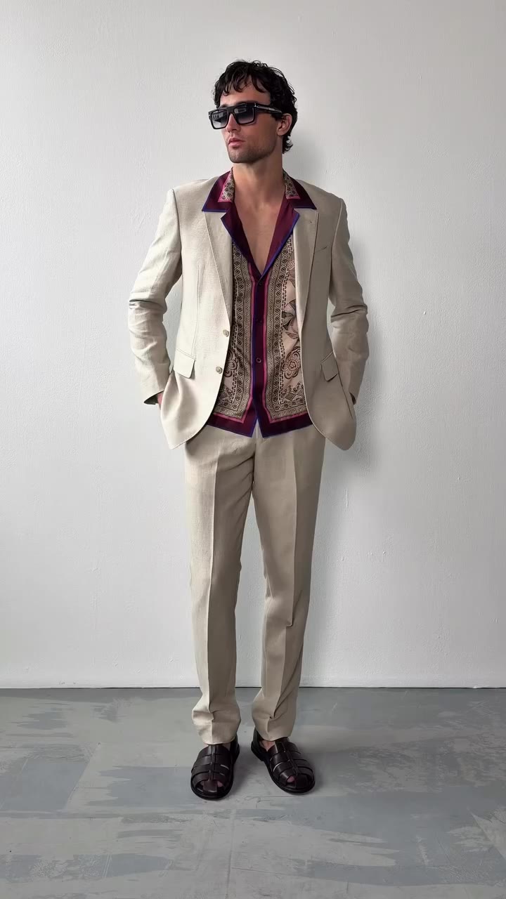 Discover the signature Linen Cotton Twill Suit, crafted from premium Italian…