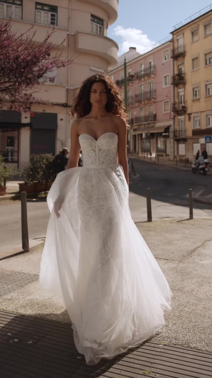 Not every dress can handle a moment like “I do.” This one can — effortlessly…