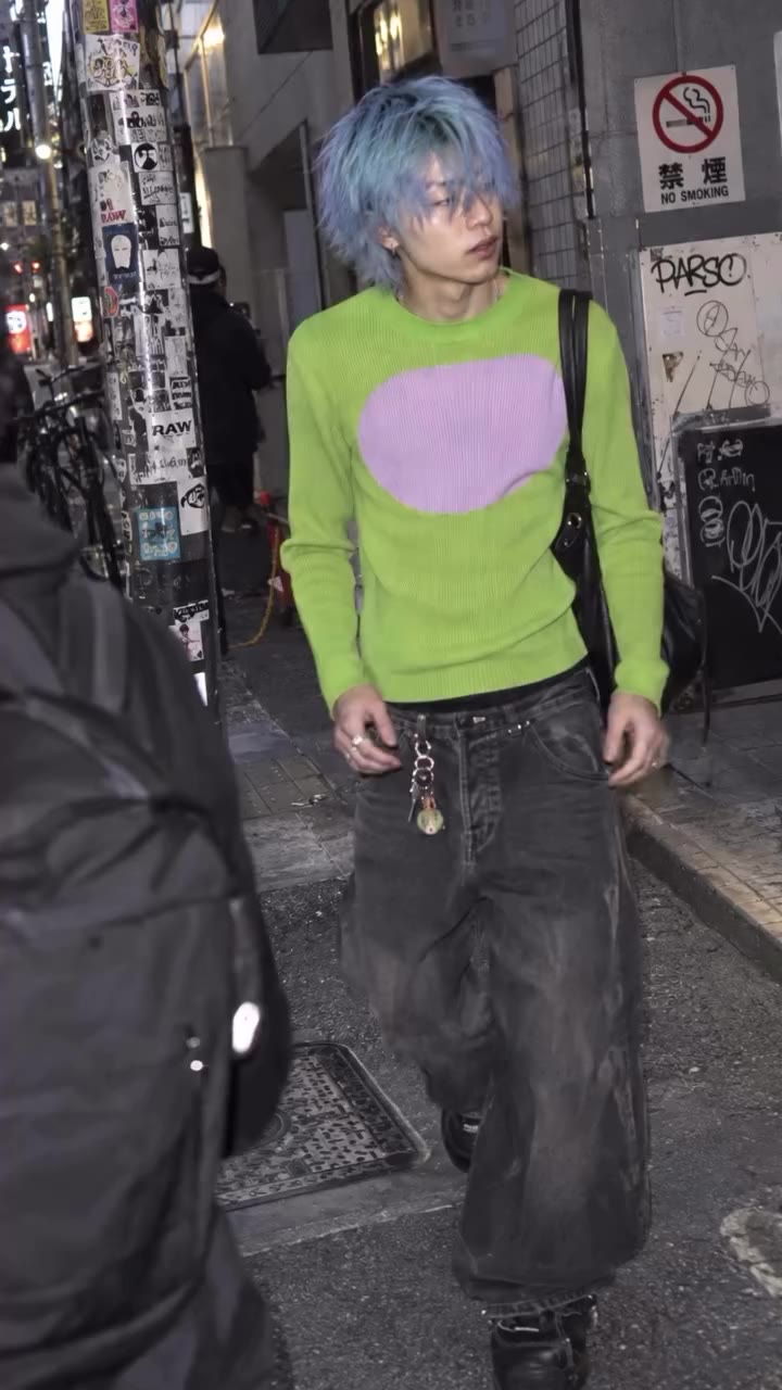 Live from Tokyo . Acid green oval jumper in recycled yarns. 🤍