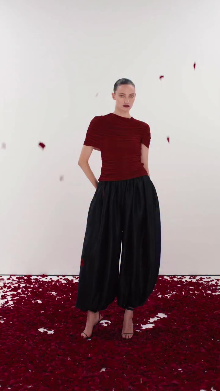 Maroon meets black, sheerness meets volume. The Gaia top and Mina pants, a…
