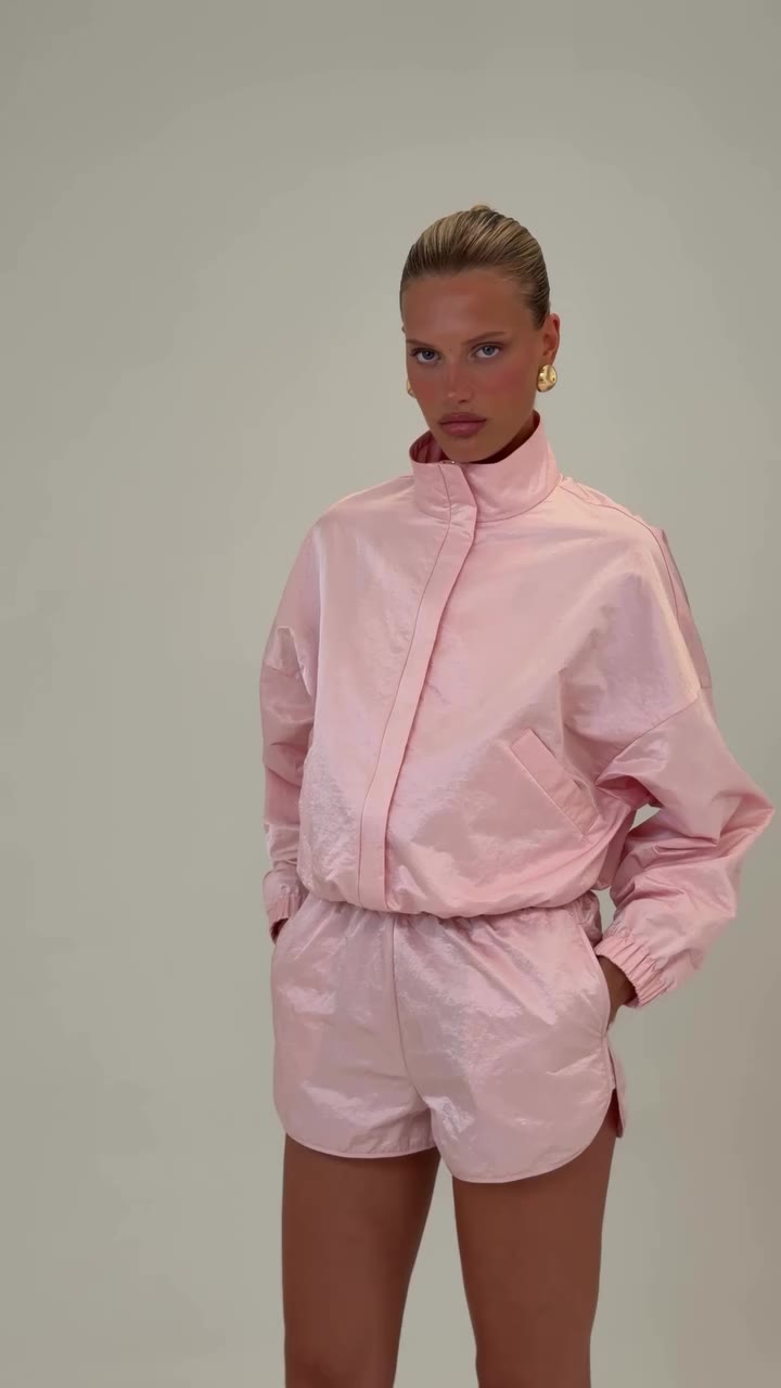Put pink funnel jacket & shorts. Available now at hyphen.store.