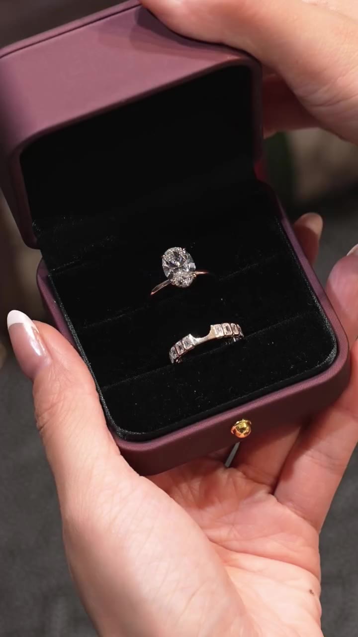 Heirloom, the quiet way. 💛 Oval solitaire with a notched baguette band in…