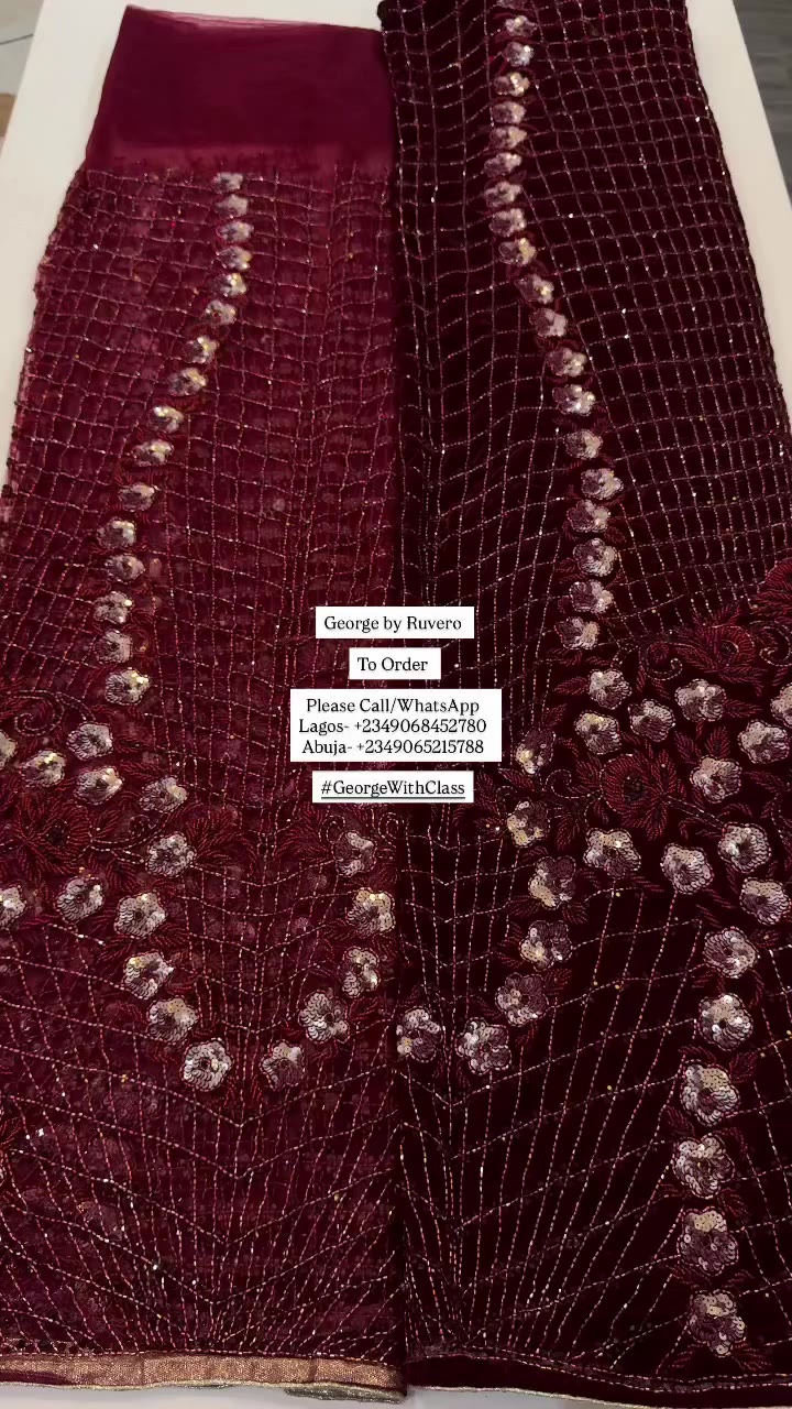 Wrapped in the richness of burgundy, adorned with exquisite beads, and…