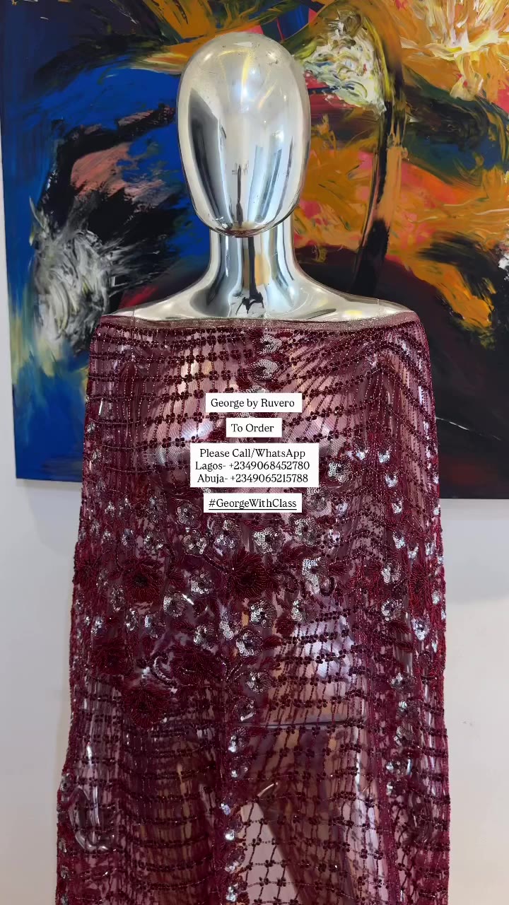 Wrapped in the richness of burgundy, adorned with exquisite beads, and…