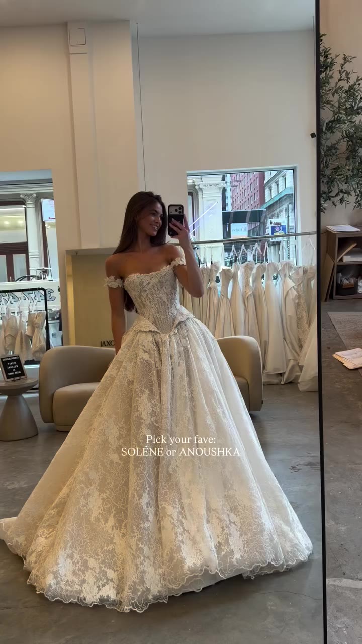 SOLÉNE or ANOUSHKA? 🦢 Which Netta BenShabu gown has your heart? Try them both…
