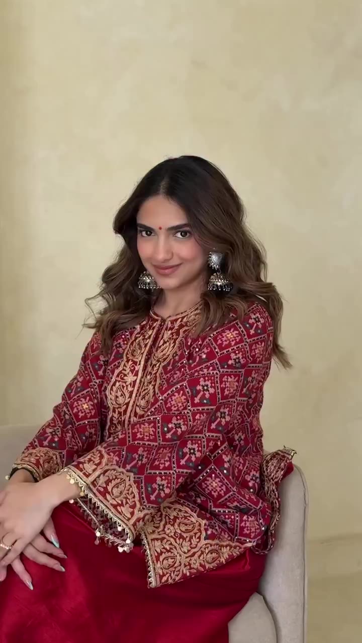 A regal take on timeless Indian elegance — a rich red printed kurta paired…